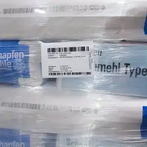 En etikett med beteckningen ”A-serien” på en krympplastförpackad mjölpall
