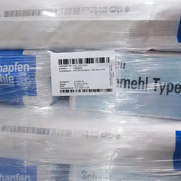 En etikett med beteckningen ”A-serien” på en krympplastförpackad mjölpall