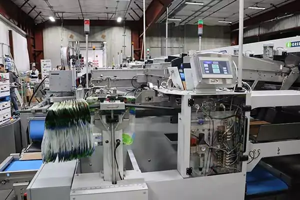 Utrustning på produktionslinjen hos Haley Manufacturing Olympic Fruit.